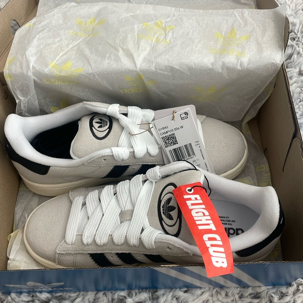 Brand new tags on Addidas Campus shoes.  Size US 7.5
